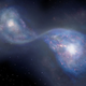 Concepción artística de dos galaxias fusionándose
llustración: National Astronomical Observatory of Japan.